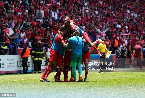 Fernando Uribe of Toluca celebrates with after scoring the third goal of his team during the semifinals second leg match between Toluca and Tijuana...