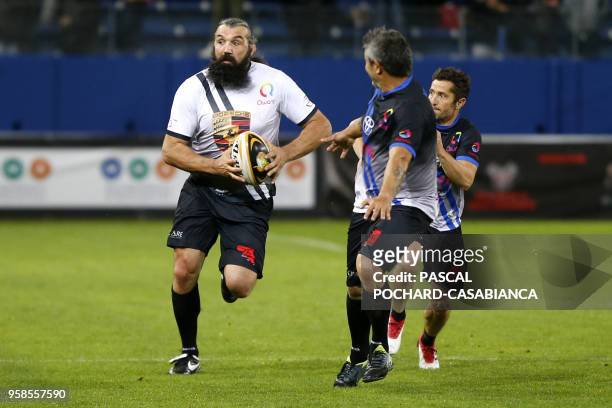 Former French rugby international Sebastien Chabal takes part in the charity match organized by French football player Pascal Olmeta for his...