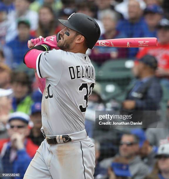 Nicky Delmonico of the Chicago White Sox bats against the Chicago Cubs at Wrigley Field on May 13, 2018 in Chicago, Illinois. The White Sox defeated...