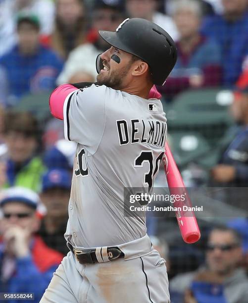 Nicky Delmonico of the Chicago White Sox bats against the Chicago Cubs at Wrigley Field on May 13, 2018 in Chicago, Illinois. The White Sox defeated...