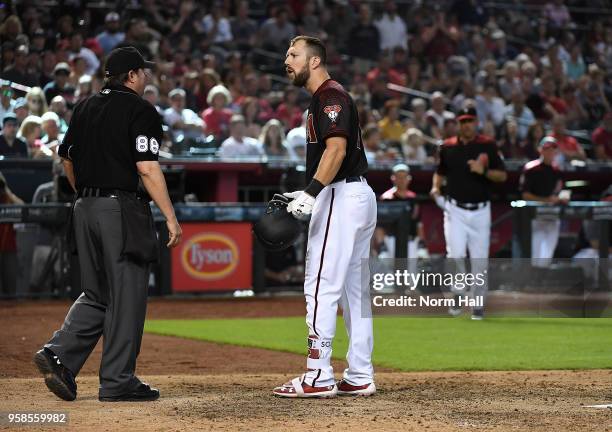 Steven Souza Jr of the Arizona Diamondbacks argues with home plate umpire Doug Eddings after being ejected during the eighth inning against the...