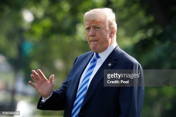 President Donald Trump walks on the South Lawn of the White House before his departure to Walter Reed Medical Center on May 14, 2018 in Washington,...