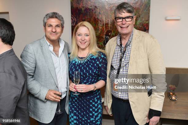 Jason Solomons, Anna Smith and Nik Powell attend IMDb's 2018 Cannes Dinner Party during the 71st Annual Cannes Film Festival at Table 22 on May 14,...