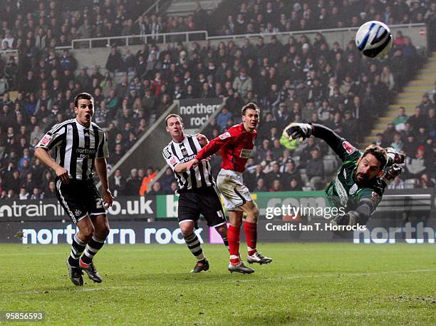 Scott Carson of West Bromwich Albion saves a last minute free kick from Danny Guthrie of Newcastle during the Coca-Cola championship match between...