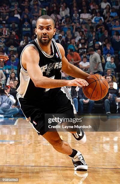 Tony Parker of the San Antonio Spurs drives against the New Orleans Hornets on January 18, 2010 at the New Orleans Arena in New Orleans, Louisiana....