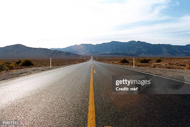 infinite road - mid section stock pictures, royalty-free photos & images