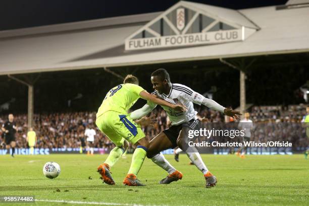 Andreas Weimann of Derby and Ryan Sessegnon of Fulham battle for the ball during the Sky Bet Championship Play Off Semi Final:Second Leg match...