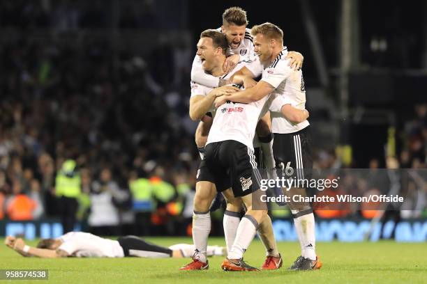 Kevin McDonald, Oliver Norwood, Tomas Kalas and Tim Ream of Fulham celebrate getting into the playoff final during the Sky Bet Championship Play Off...