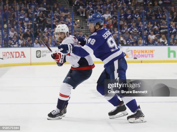 Mikhail Sergachev of the Tampa Bay Lightning checks Chandler Stephenson of the Washington Capitals in Game Two of the Eastern Conference Finals...