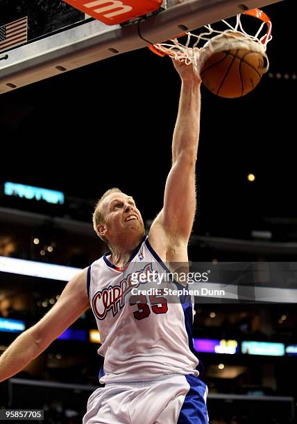 Chris Kaman of the Los Angeles Clippers dunks against the the New Jersey Nets on January 18, 2010 at Staples Center in Los Angeles, California. The...