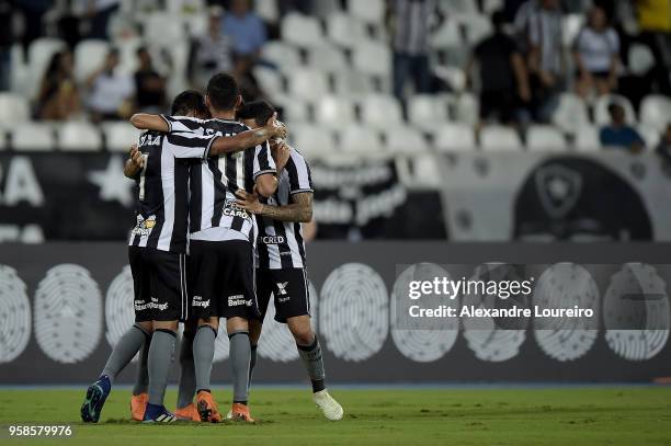 Players of Botafogo celebrates their first scored goal by Rodrigo Lindoso during the match between Botafogo and Fluminense as part of Brasileirao...