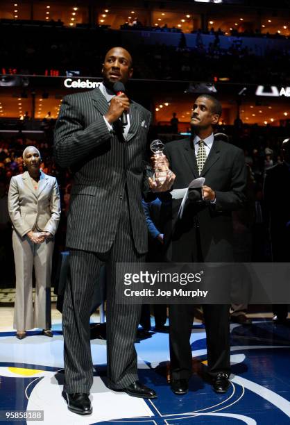 Television personality David Aldridge presents former NBA player Alonzo Mourning with the National Civil Rights Museum Sports Legacy Award before a...