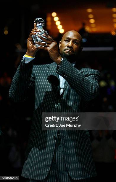 Former NBA player Alonzo Mourning receives the National Civil Rights Museum Sports Legacy Award before a game between the Memphis Grizzlies and the...