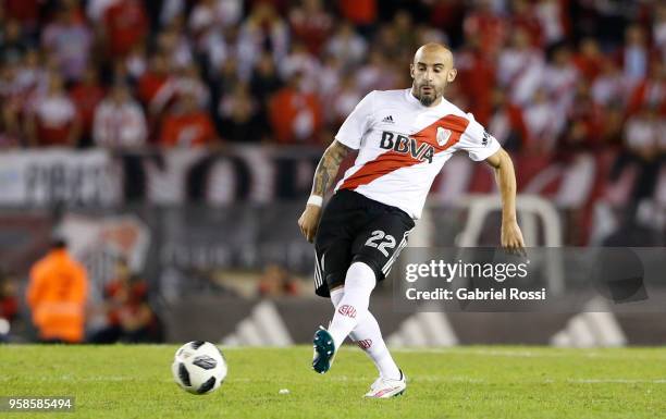 Javier Pinola of River Plate kicks the ball during a match between River Plate and San Lorenzo as part of Superliga 2017/18 at Estadio Monumental...