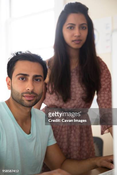 portrait of couple at home - indian wife stock pictures, royalty-free photos & images