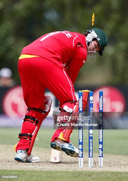 Calum Price of Zimbabwe is bowled during the ICC U19 Cricket World Cup match between New Zealand and Zimbabwe at Bert Sutcliffe Oval on January 19,...