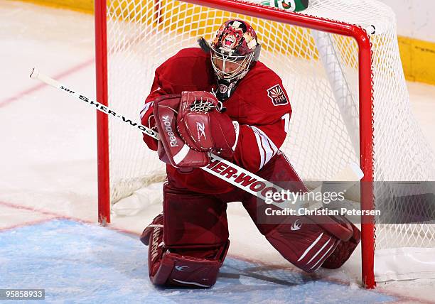 Goaltender Jason LaBarbera of the Phoenix Coyotes attempts a save on the shot from the Buffalo Sabres during the second period of the NHL game at...