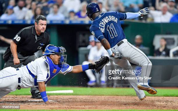 Kansas City Royals catcher Salvador Perez couldn't tag Tampa Bay Rays' Adeiny Hechavarria at the plate on an RBI single by Matt Duffy in the sixth...