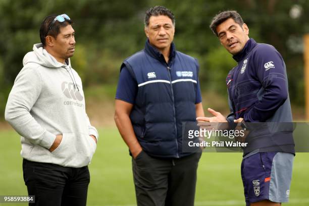Warriors coach Stephen Kearney speaks with Auckland rugby coaching staff Alama Ieremia and Filo Tiatia during a New Zealand Warriors NRL training...