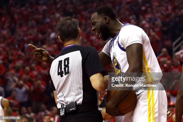 Draymond Green of the Golden State Warriors speaks to referee Scott Foster after being called for a foul in the first quarter against the Houston...