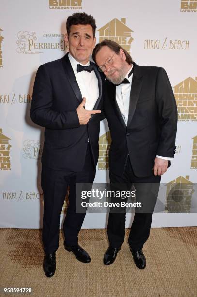 Matt Dillon and director Lars von Trier pose at Nikki Beach for the Perrier Jouet celebration of "The House that Jack Built" on May 14, 2018 in...