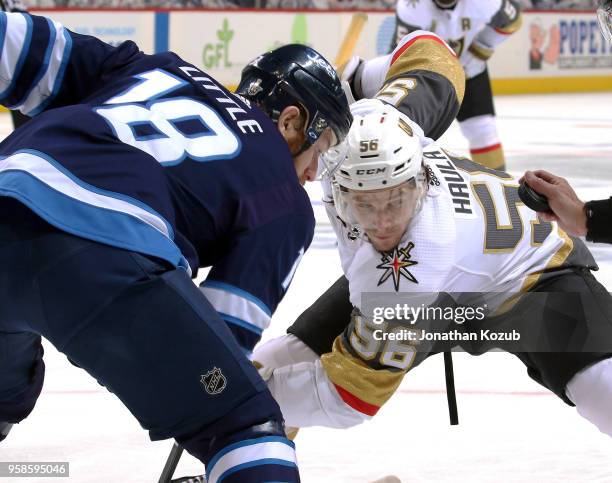 Bryan Little of the Winnipeg Jets gets set for a first period face-off against Erik Haula of the Vegas Golden Knights in Game Two of the Western...