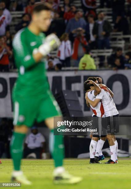 Ignacio Fernandez of River Plate celebrates with teammates after scoring the opening goal during a match between River Plate and San Lorenzo as part...