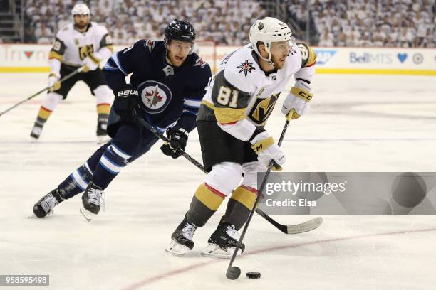 Jonathan Marchessault of the Vegas Golden Knights is defended by Andrew Copp of the Winnipeg Jets during the first period in Game Two of the Western...