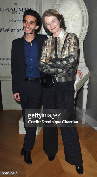 Actress Charlotte Rampling and Actor Mehdi Dehbi attend the Chaumet's Cocktail Party for Cesar's Revelations on January 18, 2010 in Paris, France.
