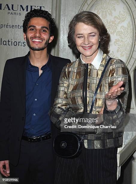 Actress Charlotte Rampling and Actor Mehdi Dehbi attend the Chaumet's Cocktail Party for Cesar's Revelations on January 18, 2010 in Paris, France.