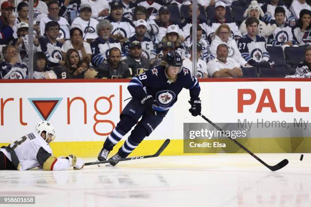 Patrik Laine of the Winnipeg Jets carries the puck against the Vegas Golden Knights during the second period in Game Two of the Western Conference...