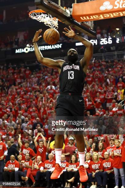James Harden of the Houston Rockets dunks in the first half against the Golden State Warriors in Game One of the Western Conference Finals of the...