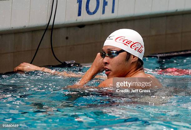 Kosuke Kitajima of Japan looks on after swimming in the Men's 100 Breaststroke Final during the Long Beach Grand Prix on January 18, 2010 in Long...