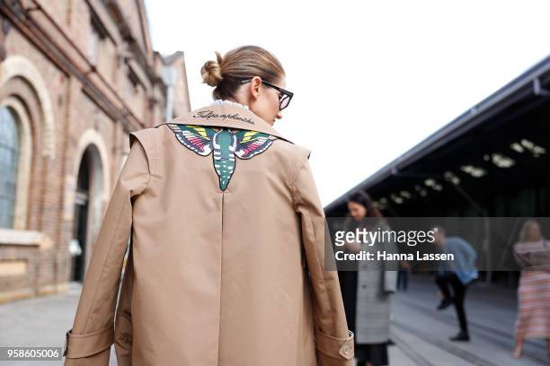 Kate Waterhouse wearing Macgraw top and skirt and Gucci trench coat during Mercedes-Benz Fashion Week Resort 19 Collections at Carriageworks on May...