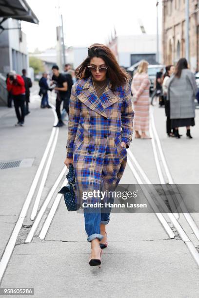 Guest wearing Rag and Bone jacket, Gucci sunglasses, Calvin Klein jeans, Velentino bag and Dior shoes during Mercedes-Benz Fashion Week Resort 19...