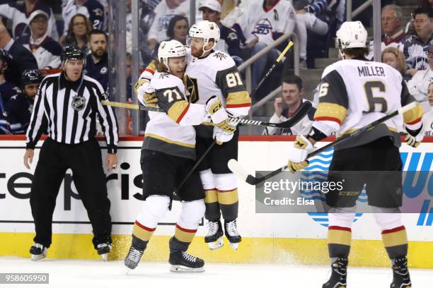 Jonathan Marchessault of the Vegas Golden Knights is congratulated by his teammate William Karlsson after scoring a third period goal against the...