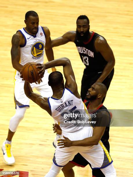 Chris Paul of the Houston Rockets defends Kevin Durant of the Golden State Warriors in the first half in Game One of the Western Conference Finals of...