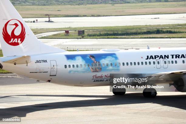 The 'Amuro Jet', Japan Transocean Air airplane with portrait of singer Namie Amuro on its body is seen at Fukuoka Airport on May 14, 2018 in Fukuoka,...