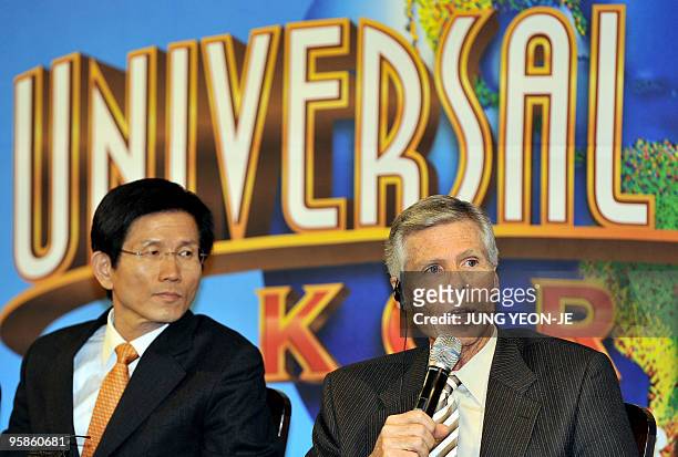 Universal Parks and Resorts chairman and CEO Thomas Williams speaks as Kim Moon-Soo , governor of Gyeonggi province, looks on at a signing ceremony...