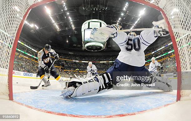 Jonas Gustavsson of the Toronto Maple Leafs makes a kick save against Steve Sullivan of the Nashville Predators on January 18, 2010 at the Sommet...