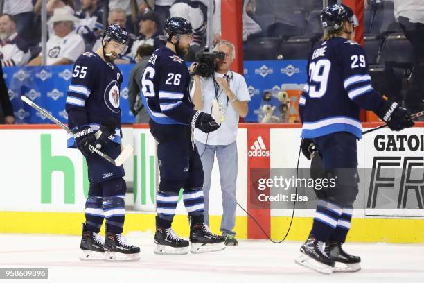 Mark Scheifele of the Winnipeg Jets skates off the ice with his teammates after their defeat to the Vegas Golden Knights in Game Two of the Western...