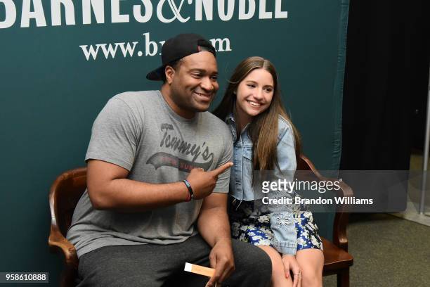 Mackenzie Ziegler poses with fans during the celebration of her new book, "Kenzie's Rules for Life" at Barnes & Noble at The Grove on May 14, 2018 in...