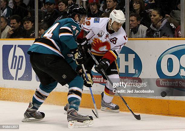 Daymond Langkow of the Calgary Flames skates against Marc-Edouard Vlasic of the San Jose Sharks during an NHL game at the HP Pavilion on January 18,...