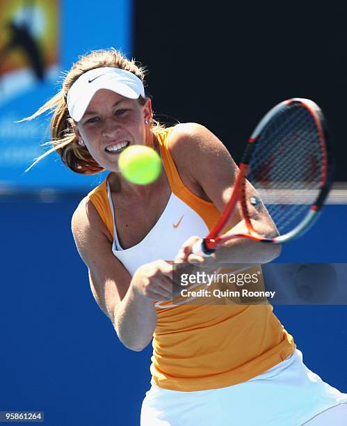 Olivia Rogowska of Australia plays a backhand in her first round match against Sorana Cirstea of Romania during day two of the 2010 Australian Open...