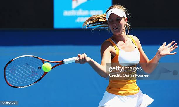 Olivia Rogowska of Australia plays a forehand in her first round match against Sorana Cirstea of Romania during day two of the 2010 Australian Open...