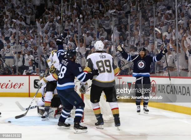 Bryan Little and Kyle Connor of the Winnipeg Jets celebrate a third period goal against the Vegas Golden Knights in Game Two of the Western...