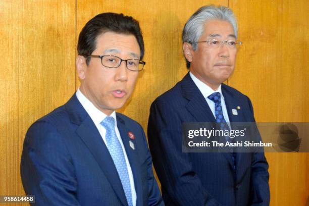 Sapporo City Mayor Katsuhiro Akimoto and Japan Olympic Committee President Tsunekazu Takeda speak to media reporters after their meeting on May 14,...