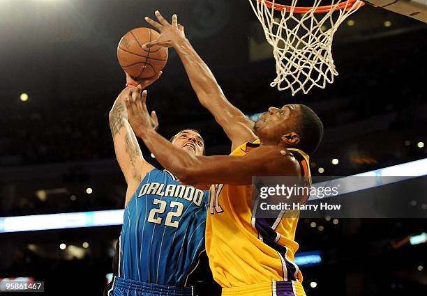 Andrew Bynum of the Los Angeles Lakers blocks the shot by Matt Barnes of the Orlando Magic in the third quarter during the game on January 18, 2010...