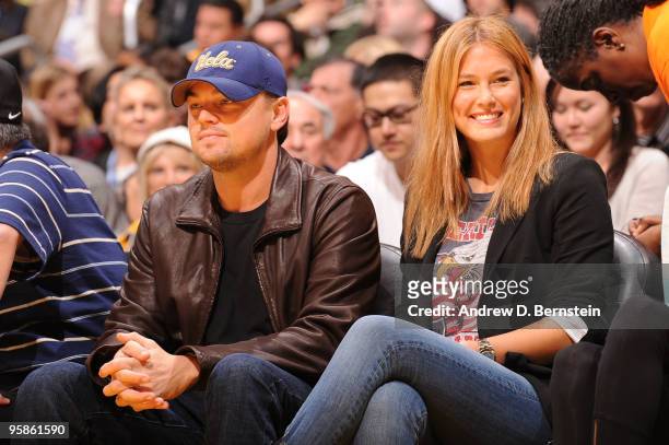 Actor Leonardo DiCaprio and Supermodel Bar Refaeli attend a game between the Orlando Magic and the Los Angeles Lakers at Staples Center on January...
