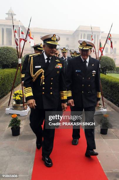 Indian Navy Chief Admiral Nirmal Verma speaks with Commander-in-Chief of the Israeli Navy Vice Admiral Eliezer Marom prior to a meeting in New Delhi...